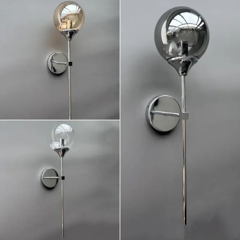 Modern golden glass ball wall sconce with chrome finish and clear glass globe from decorbites golden glass collection