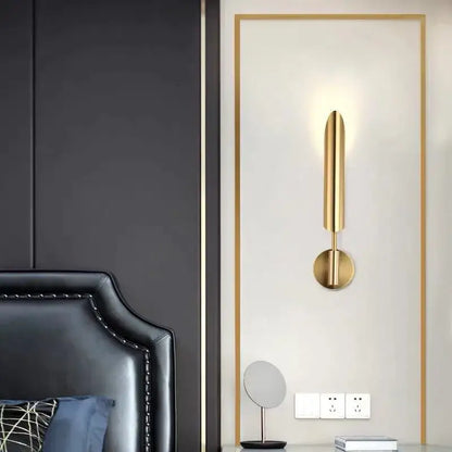 Modern golden inclined tube wall lamp with gold finish and sleek vertical design for luxury living room decorbites golden inclined