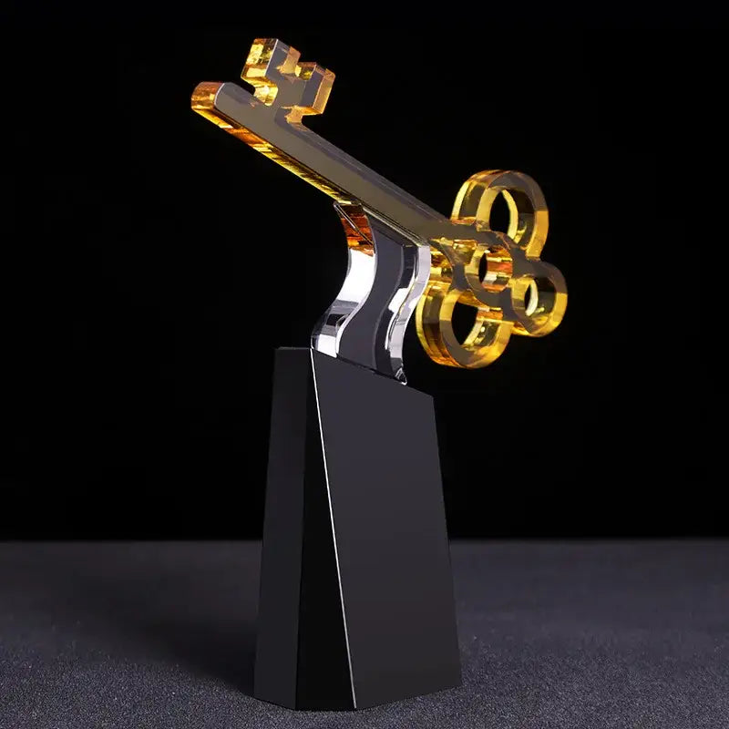 Modern golden key crystal trophy with translucent gold head and silver stem perfect for decorbites crystal trophy display