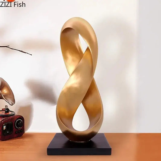 Modern golden knot sculpture with smooth reflective surface on black base ideal as knot sculpture desk decorbites ornament