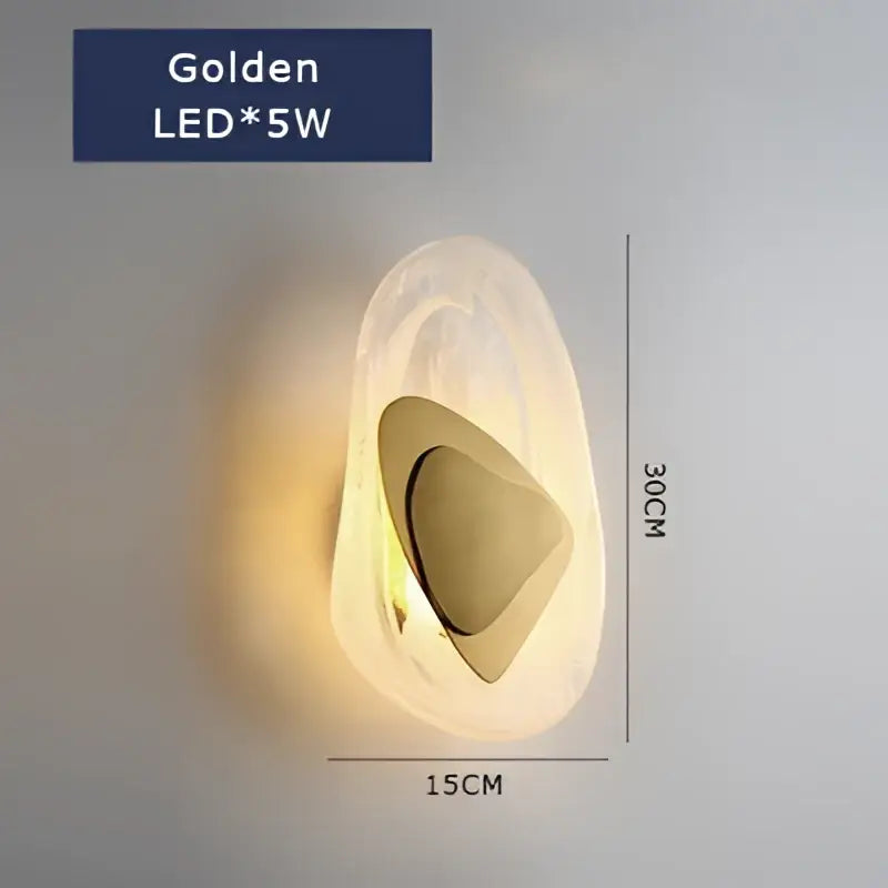 A modern golden led cloud wall lamp with a translucent white shell and golden accent for bedroom decorbites decor