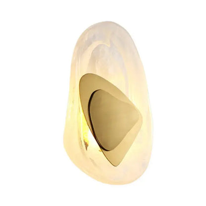 A sleek golden led cloud wall lamp with translucent gold tone and metallic triangular cutout for bedroom decorbites decor