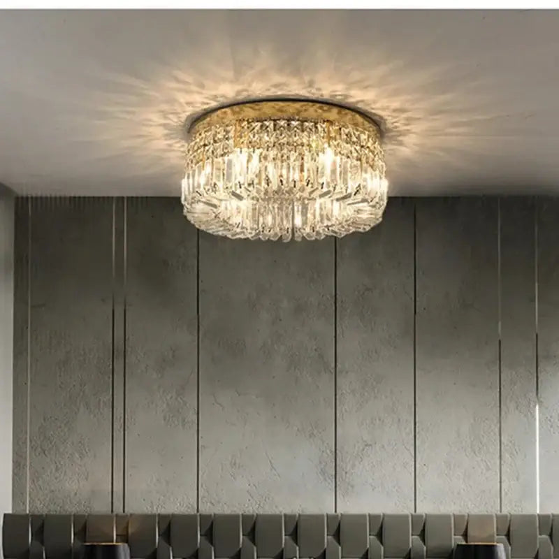 Modern golden led crystal ceiling lamp with gold-toned frame and clear glass prisms for living room decorbites golden led
