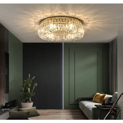 Modern golden led crystal ceiling lamp with a gold-toned frame and faceted glass crystals for living room decorbites golden led