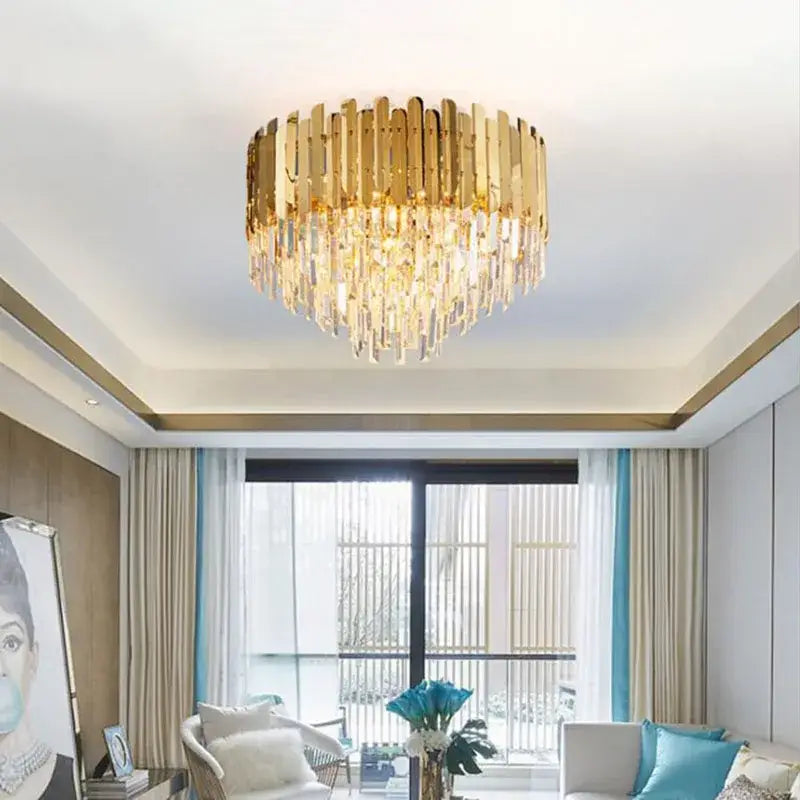 Modern golden led crystal ceiling light featuring gold-toned chandelier with vertical and dangling crystal prisms decorbites golden led