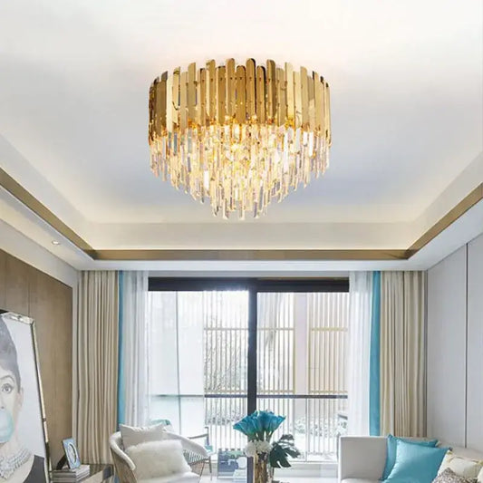 Modern golden led crystal ceiling light featuring gold-toned chandelier with vertical and dangling crystal prisms decorbites golden led