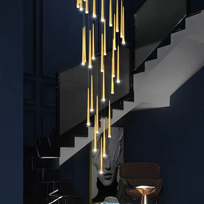Modern golden led tapered chandelier with cylindrical pendant lights in cascading arrangement for living room decorbites golden led