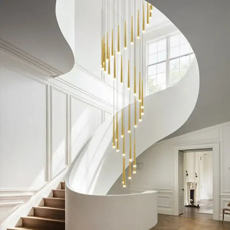 Modern golden led tapered chandelier featuring cylindrical pendant lights in a cascading arrangement for living room decorbites golden led