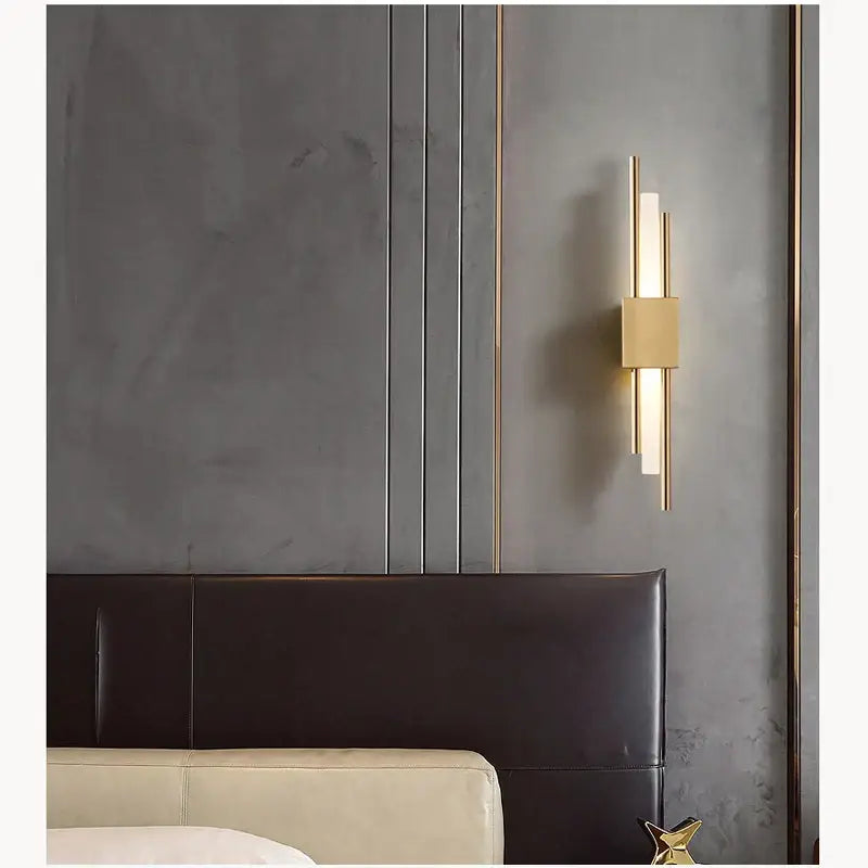 Modern golden led wall lamp with gold-toned vertical rectangular light bars and central square accent for bedroom decorbites lighting