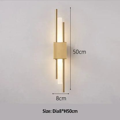 Modern golden led wall lamp with minimalist gold-toned rods and illuminated bar for bedroom ambient lighting decorbites golden led