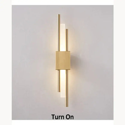 Modern golden led wall lamp with sleek vertical rods and central diffuser emitting warm light for bedroom ambient lighting