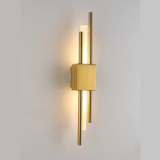 Modern golden led wall lamp with sleek cylindrical rods and square base for bedroom ambient lighting decorbites golden led
