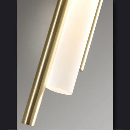 Modern golden led wall lamp with sleek gold metal frame and white glass shade for bedroom ambient lighting decorbites golden led