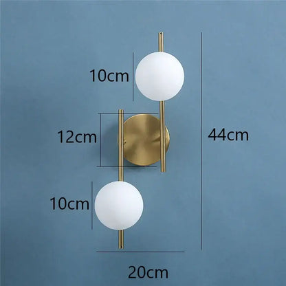 Modern golden led wall lights feature a gold-toned wall sconce with two frosted milky glass spheres for bedroom decorbites golden led
