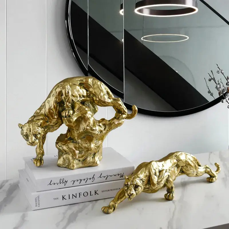 Modern golden leopard resin sculpture with textured metallic finish in dynamic pose for living room decorbites decor