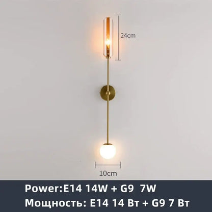 Modern golden metal led wall lamps featuring a brass cylindrical glass shade for bedroom and living room decorbites decor