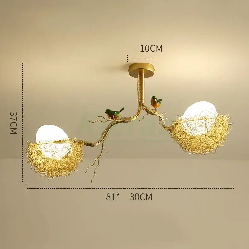 Modern golden nest glass led ceiling lamp with two woven nests, white egg bulbs, and bird figurines for living room decor