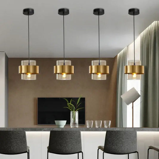 Four modern decorbites golden pendant lights with gold-finished shades and clear glass for bedroom chandelier decor