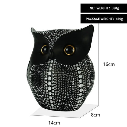 Black owl figurine with dotted pattern and gold-rimmed eyes decorbites golden owl animal statues for modern decor
