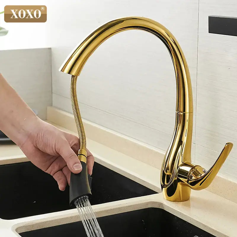 Golden pull out kitchen faucet by decorbites with a sleek curved spout and flexible spray head in chrome finish