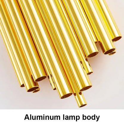 Modern golden radiant led wall lamp featuring golden aluminum lamp body tubes with a polished reflective finish