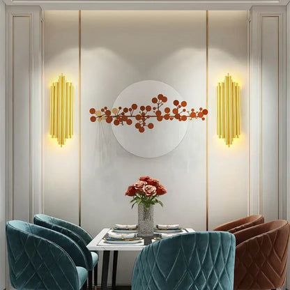A modern golden radiant led wall lamp with metallic branch design and orange gold accents for bedroom decorbites led wall