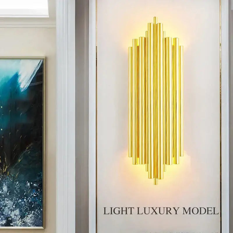 Modern golden radiant led wall lamp featuring vertical cylindrical rods in a stylish decorbites led wall sconce design