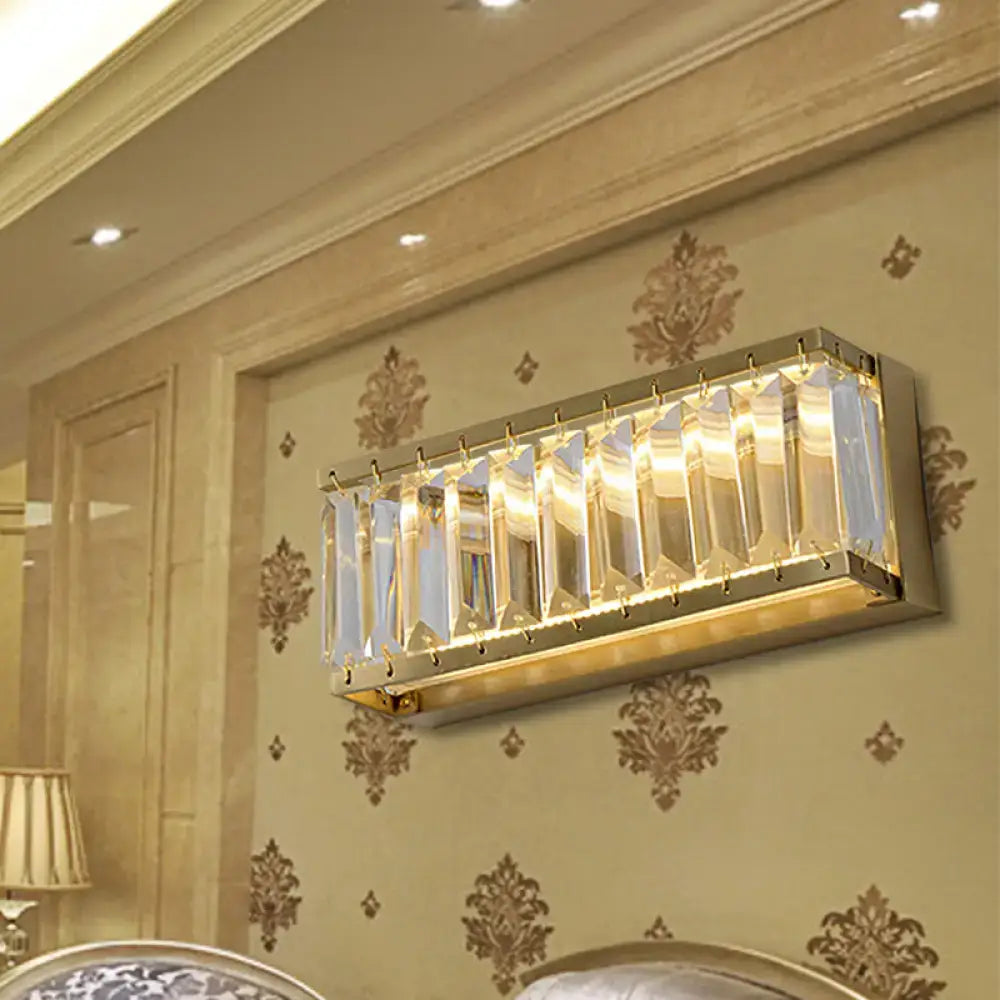 Modern golden rectangle led wall sconce with clear faceted crystal bars and gold-toned rectangular design