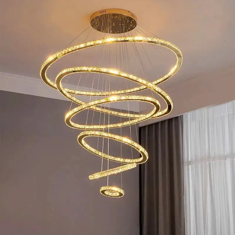 Modern golden spiral crystal stair chandelier with crystal-encrusted rings and warm led lighting for living rooms