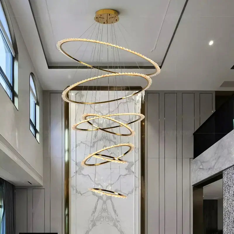 Modern golden spiral decorbites crystal chandelier with crystal accents hanging from ceiling for living room light