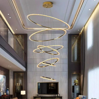 Modern golden spiral decorbites crystal chandelier with crystal accents hanging from ceiling for living room lighting