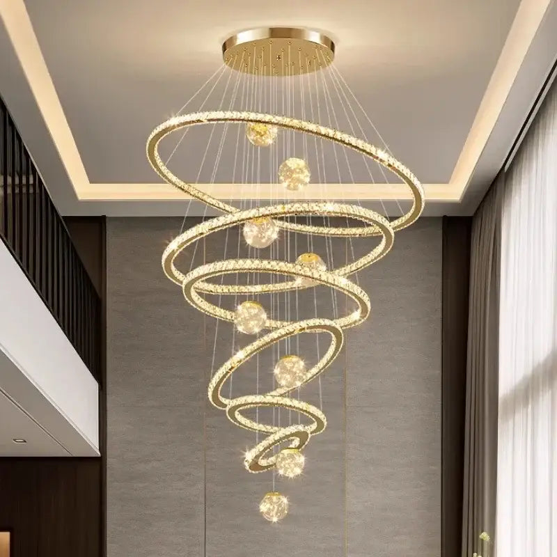 Modern golden spiral decorbites crystal led chandelier with crystal-encrusted rings and spherical accents for living room