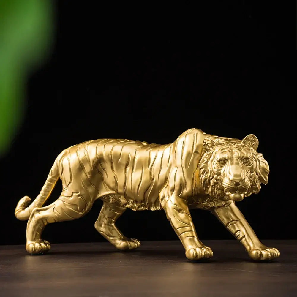 Modern golden tiger resin figurine with detailed stripes and lifelike posture crafted from polished metal for decor