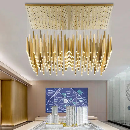 Modern golden tube led chandelier with rectangular top panel and cascading cylindrical fixtures for living room decorbites golden tube