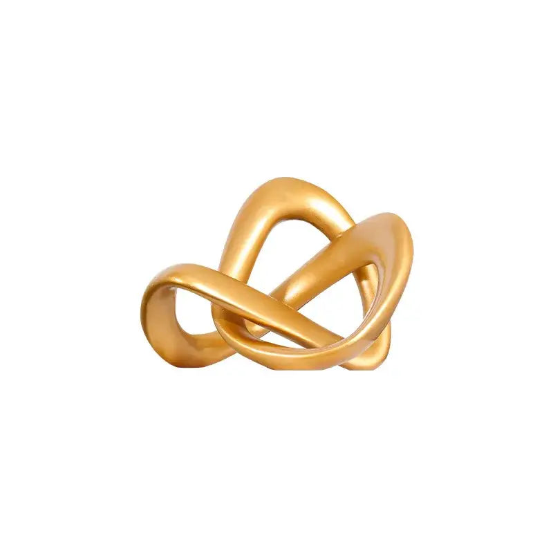 Modern golden twisted dough rope knot sculpture featuring a gold-colored abstract ring with smooth interwoven bands for living room decor
