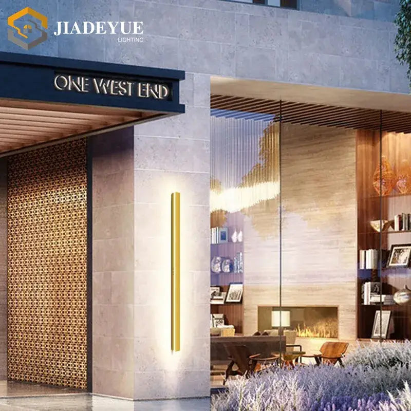 A sleek vertical gold-colored led wall light with minimalist design decorbites golden modern outdoor lighting ip65 waterproof