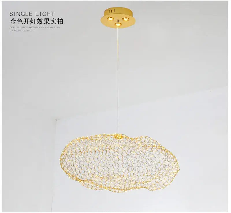 Gold-colored pendant light with mesh wireframe and three embedded lights in ceiling mount decorbites cloud pendant