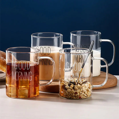 Clear glass good morning glass mugs by decorbites with transparent handles filled with beverages and granola