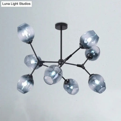Modern black metal chandelier with eight gradient blue glass globe shades for living room lighting