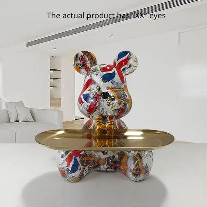 Glossy gore bite graffiti bear figurine with union jack urban street art and gold metallic accents for living room decor