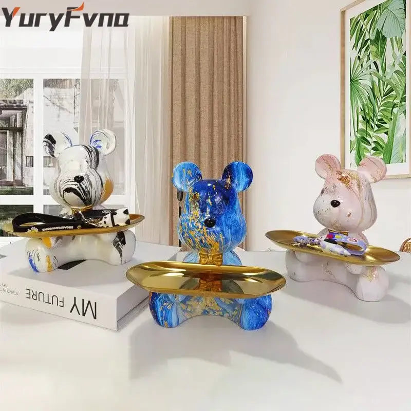 Three glossy marbled ceramic bear figurines in blue gold black white and pink gold with golden skateboard bases decorbites graffiti bear decor