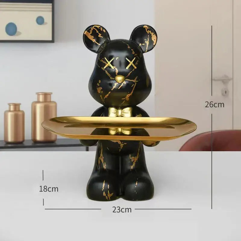 Black bear figurine with gold marble streaks and a golden bow tie holding a tray for modern living room decorbites graffiti bear decor