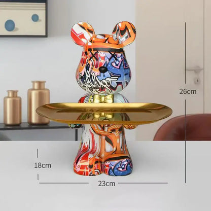 Modern graffiti bear figurine ceramic bear with vibrant orange red blue white paint splashes and gold tray for living room decorbites bear figurine