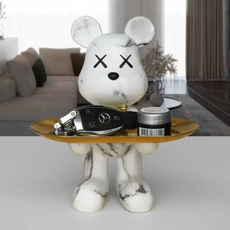 White marble-patterned kaws-style bear figurine holding a golden tray decorbites graffiti bear for living room decor