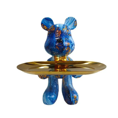 Blue bear statue ornament with gold leaf accents and golden bow tie holding a shiny gold tray for home decor