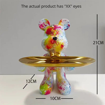 Modern graffiti bear statue ornament in colorful splatter paint holding a gold tray for home decor display