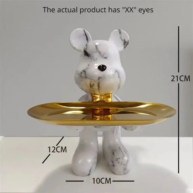 White marble-patterned bear statue ornament with gold accents holding a golden tray for modern home decor