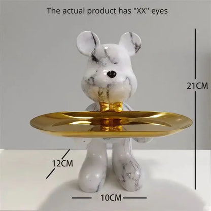 White marble-patterned bear statue ornament with gold accents holding a golden tray for modern home decor