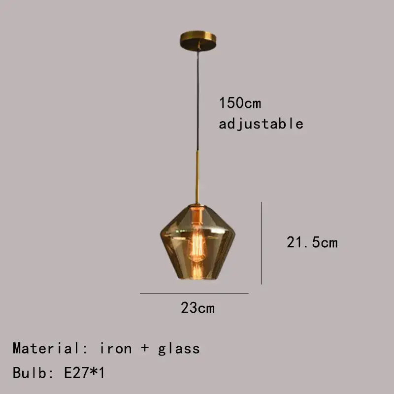 Modern gray amber glass pendant lamp with brass-finished iron frame and smoked glass shade for dining room lighting