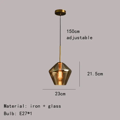 Modern gray amber glass pendant lamp with brass-finished iron frame and smoked glass shade for dining room lighting